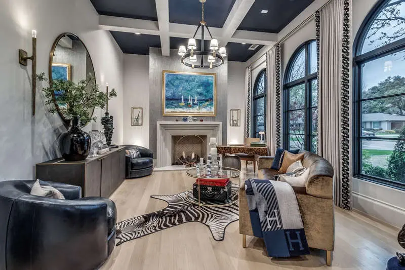 Living room with a navy painted coffered ceiling, white walls and arched windows, residential painting in Dallas, Texas
