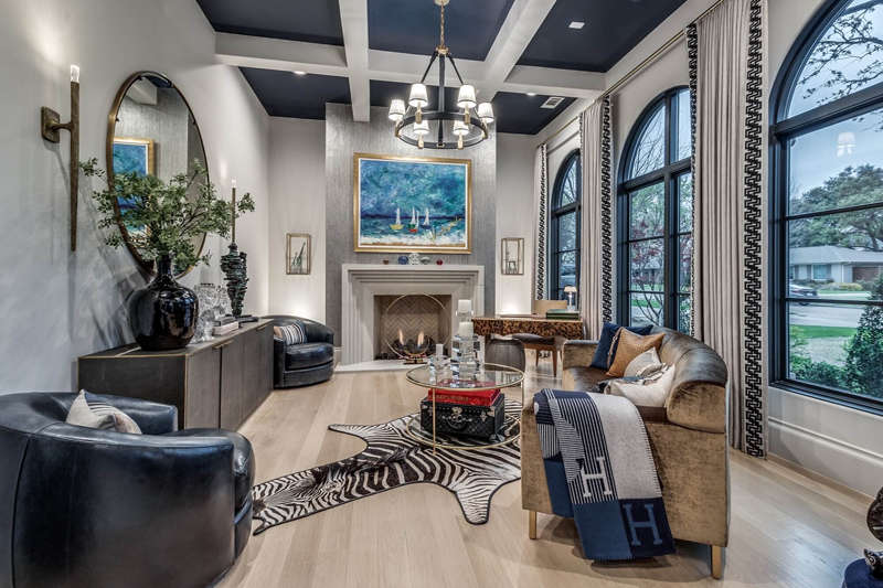 Living room with a navy painted coffered ceiling, white walls and arched windows, residential painting in Dallas, Texas