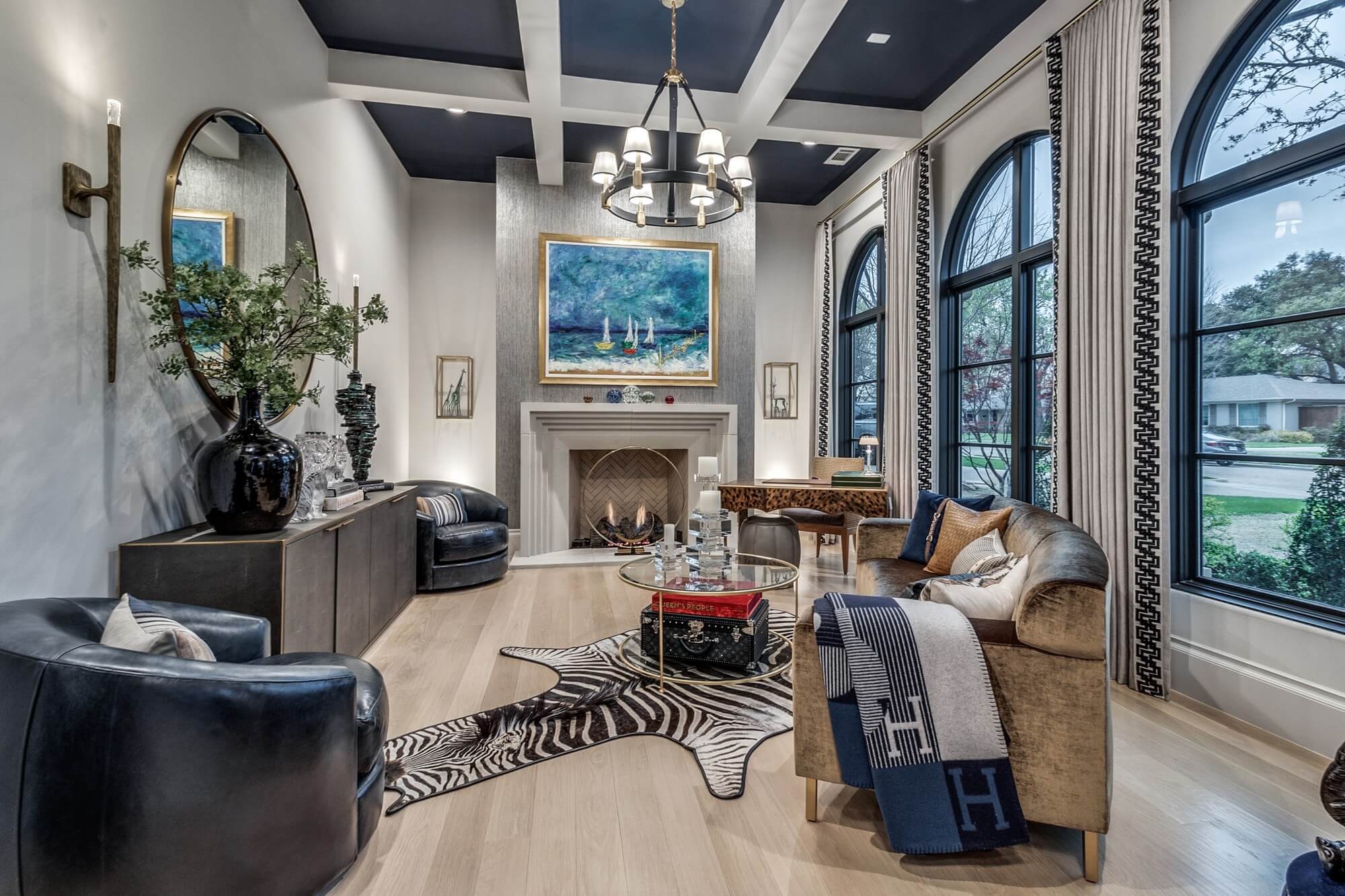 Living room with a navy painted coffered ceiling, white walls and arched windows, residential painting in Dallas, Texas
